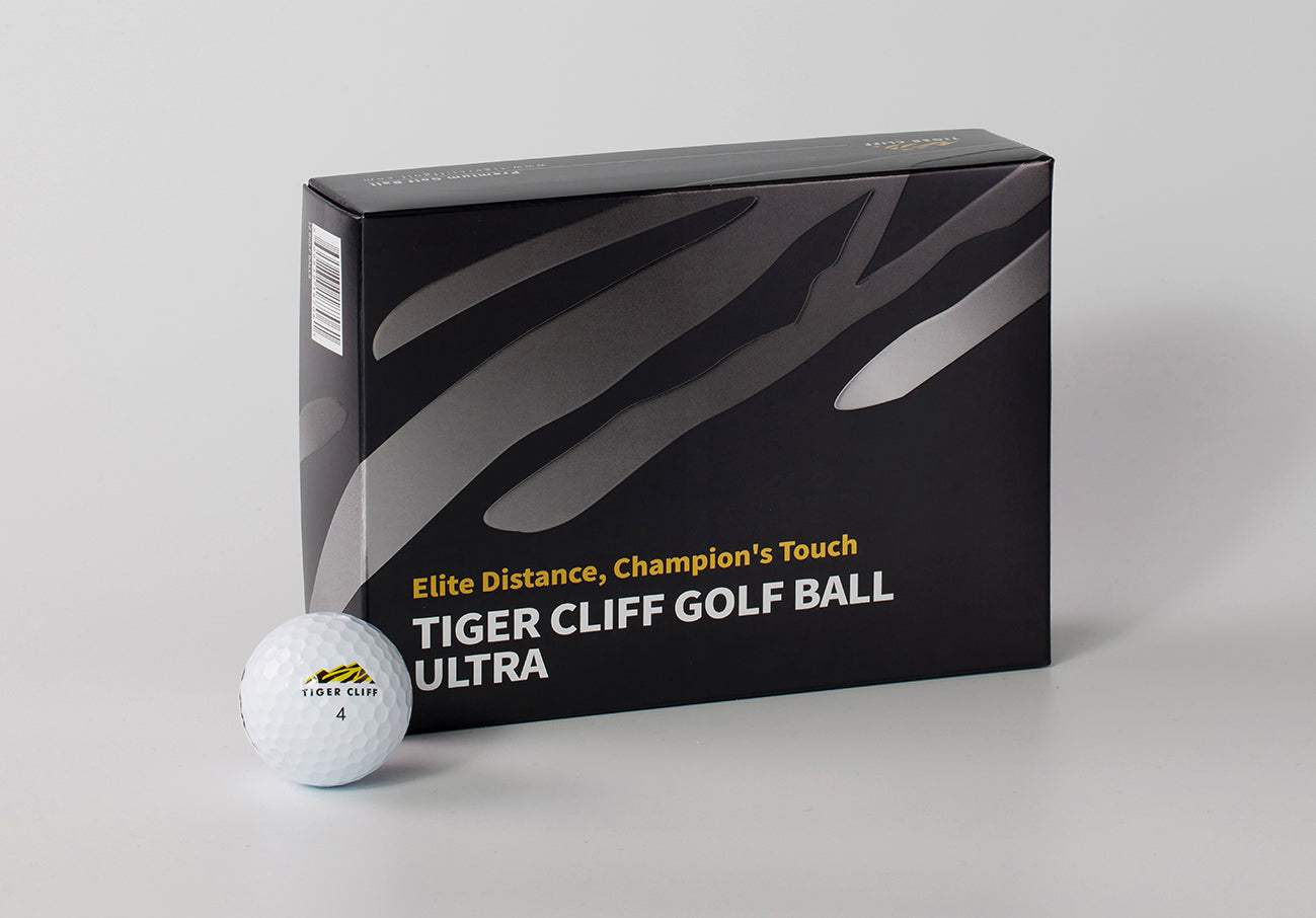 Tiger Cliff Golf Ball Ultra packaging with a golf ball on a gray background