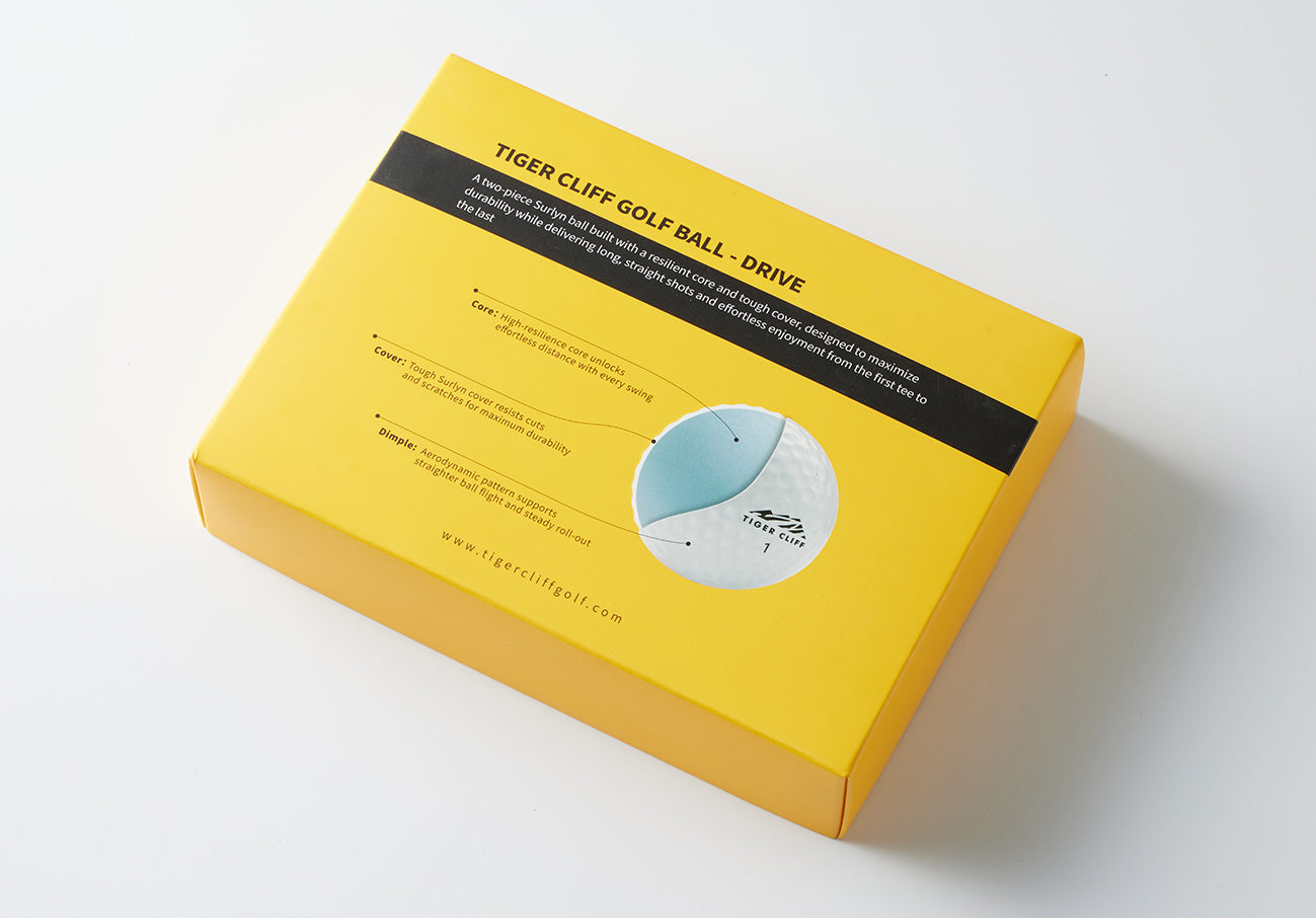 Yellow box for Tiger Cliff Golf Ball - Drive, showing ball's features.