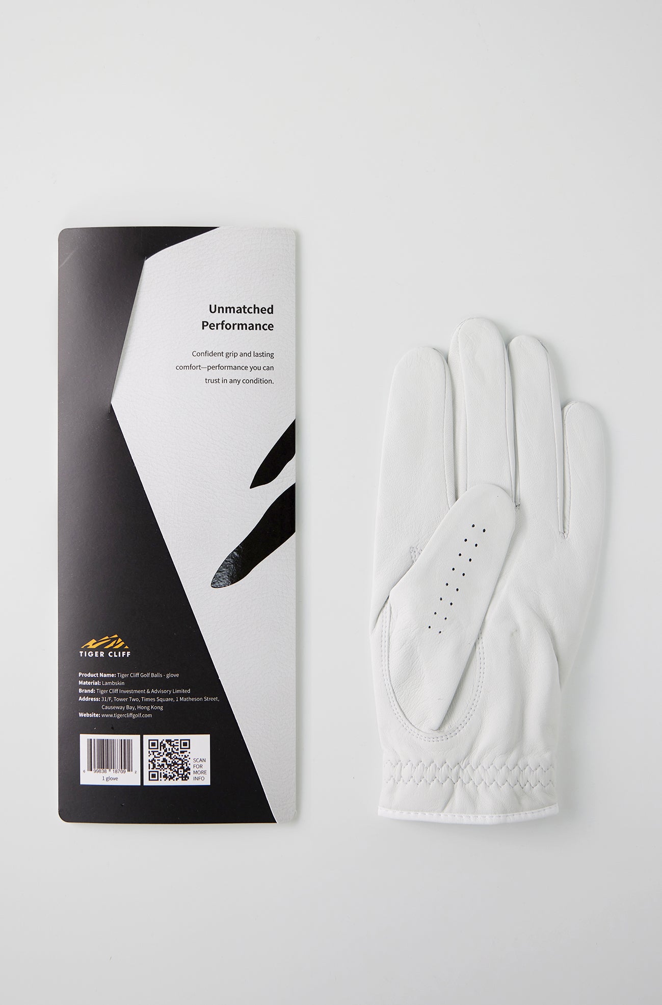Tiger Cliff Lambskin golf glove with packaging.