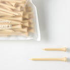Bag of Tiger Cliff Tee - Bamboo (75 pack) with two tees outside the bag.