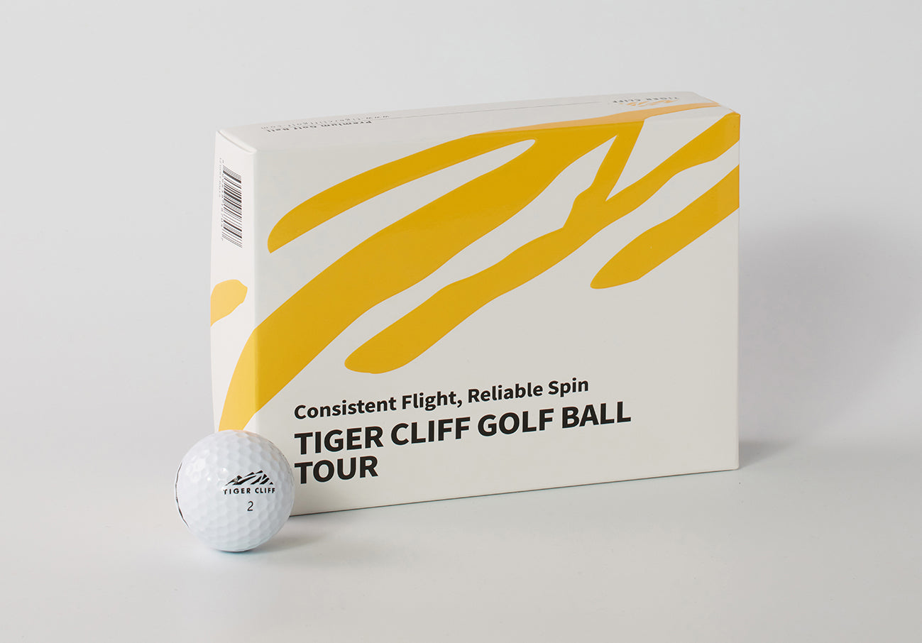 Tiger Cliff Golf Ball Tour packaging with a golf ball on a light gray background