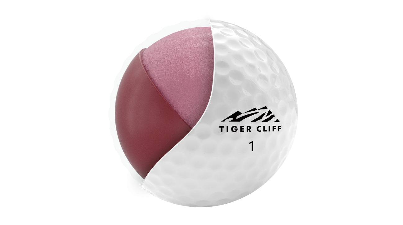 Golf ball with red and white design on a white background, featuring the brand 'Tiger Cliff'.