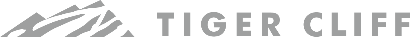 Tiger Cliff logo: Gray mountains and the company name in gray block letters.